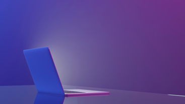 En mac på et bord. Foto: Akademikerne pluss