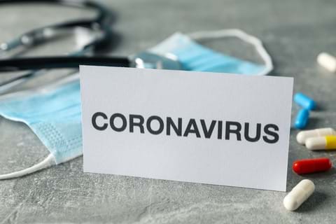 coronavirus skrevet p&#229; lapp