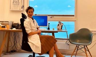 Doctor sitting in office. Ina Grung på legekontoret foto privat